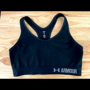 Under Armour- black, size medium, compression sports bra. Excellent condition.